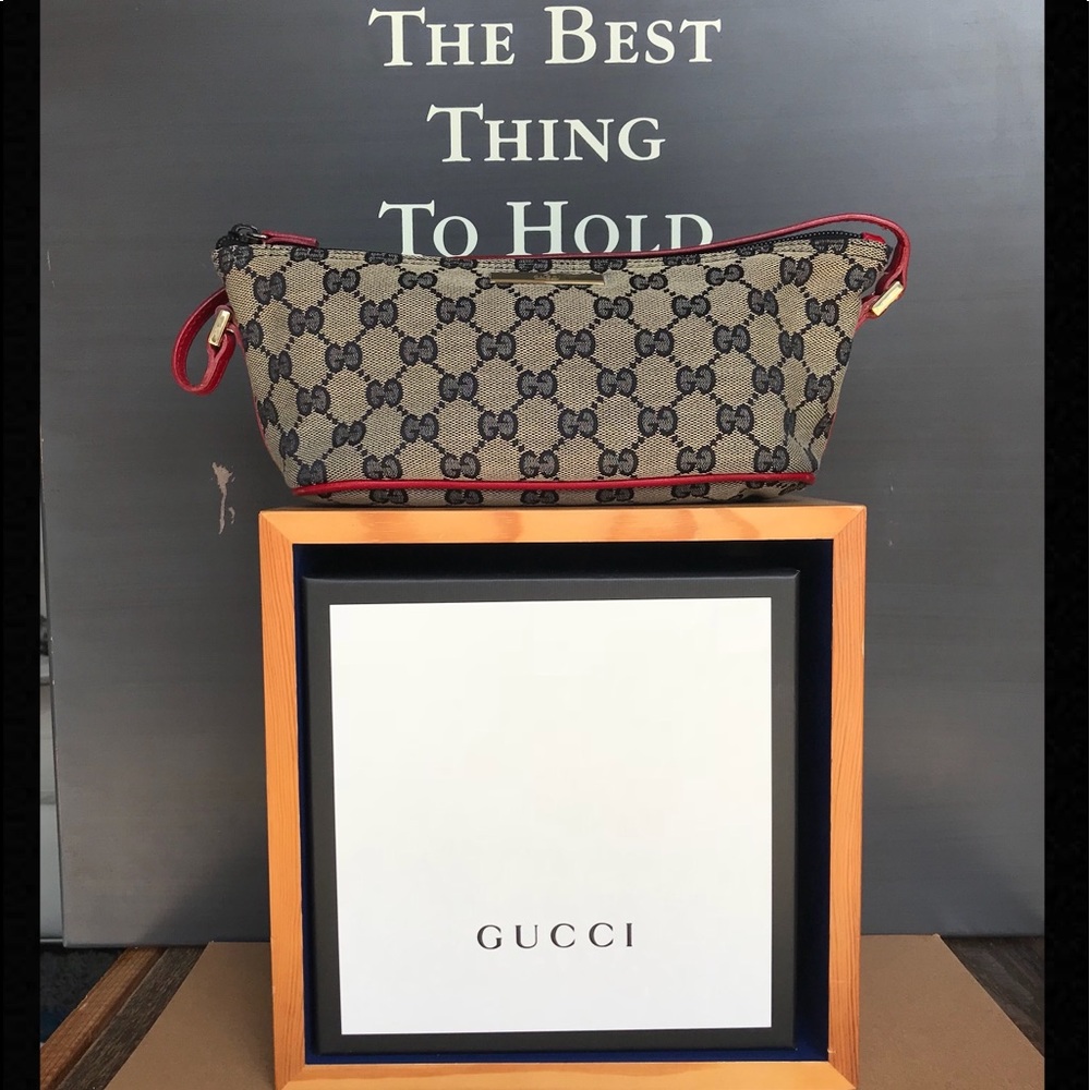 Gucci
Gg Supreme Small Beige Canvas Clutch
